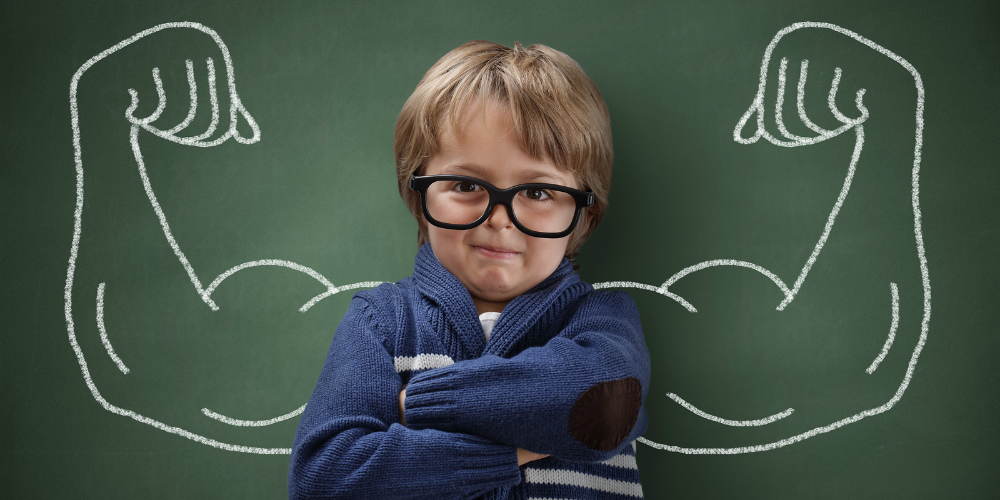 bigstock-Strong-man-child-showing-bicep-104490638