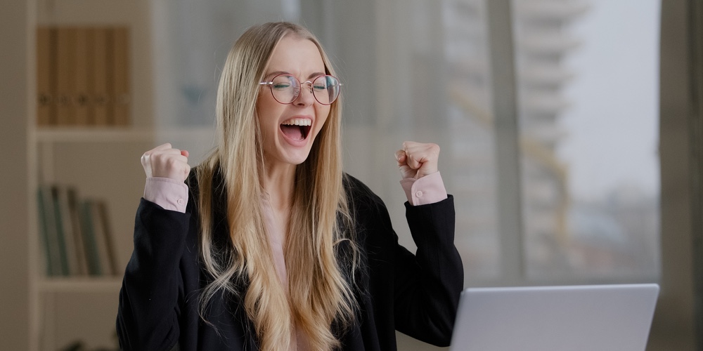 Successful Caucasian Millennial Business Woman Girl In Glasses Wins In Online Betting Receives Notif