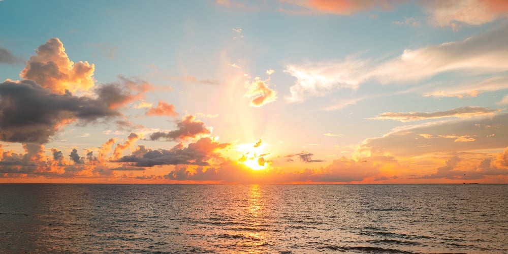 Sunset On Tropical Beach Sea Ocean With Sunrise Clouds. Banner For Travel Vacation. Scenery Sky And
