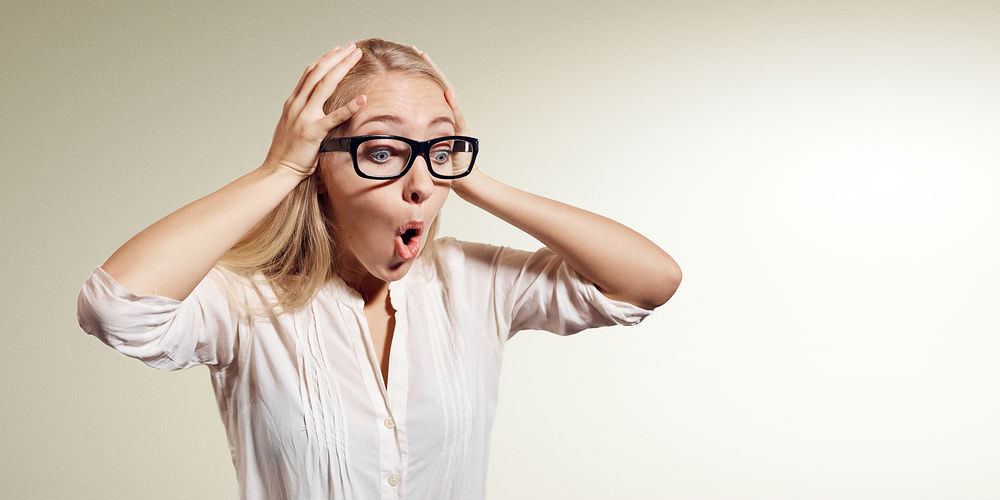 bigstock-Surprise-Astonished-Woman-Clo-118092593