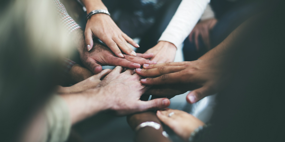 bigstock-Teamwork-Join-Hands-Support-To-116651945