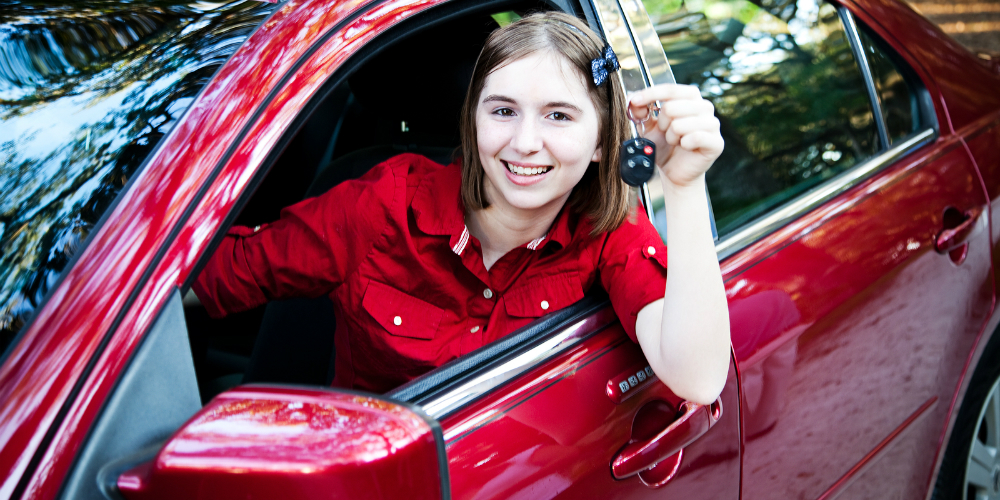 bigstock-teenage-girl-with-her-driver-s-81521609