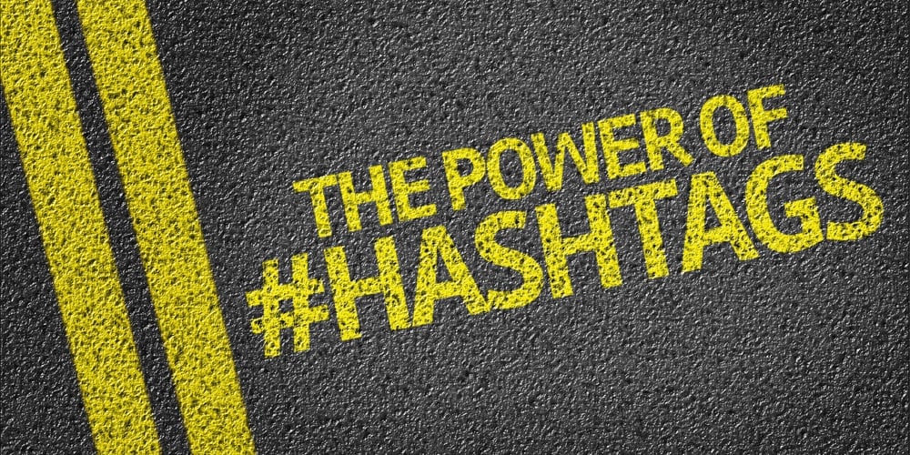 The Power Of Hashtags written on the road