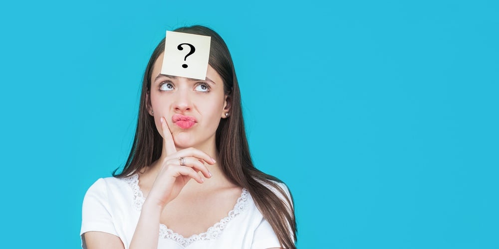 bigstock-Thinking-Woman-With-Question-M-397193309
