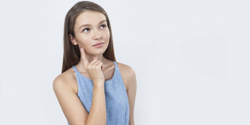 bigstock-Thoughtful-Woman-In-Blue-Dress-155057828