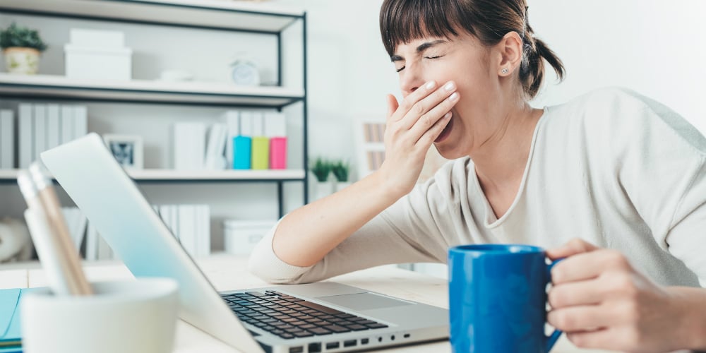 bigstock-Tired-Woman-At-Office-Desk-119626298
