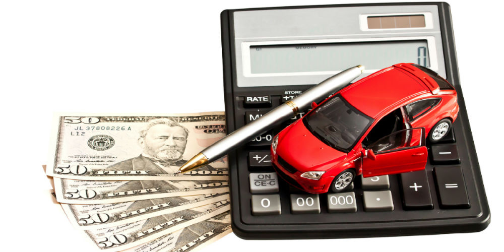 bigstock-Toy-Car-Money-And-Calculator-44630149