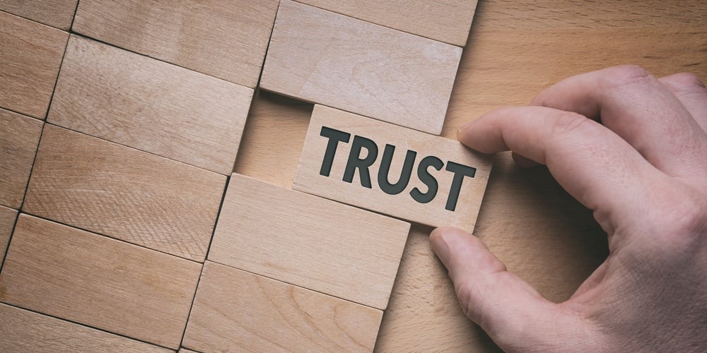 bigstock-Trust-Word-Written-On-Wooden-B-291450460