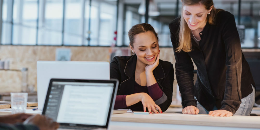 bigstock-Two-Young-Woman-Working-On-A-N-82256669