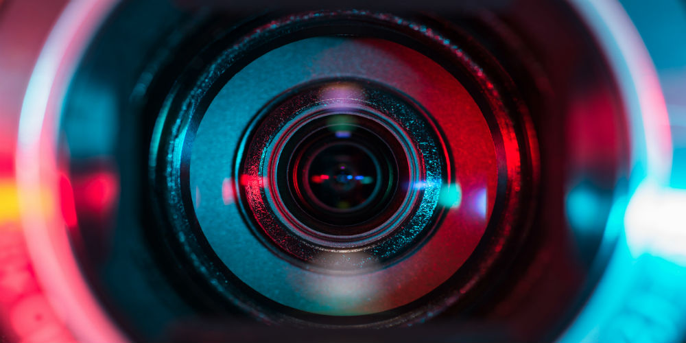 bigstock-Video-camera-lens-60897314