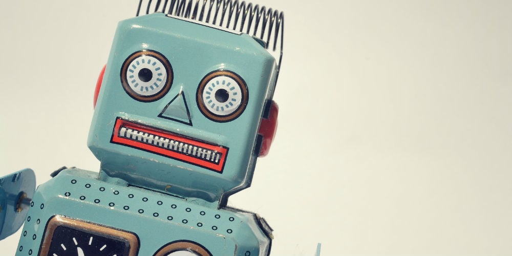 bigstock-Vintage-tin-toy-robot-56046329