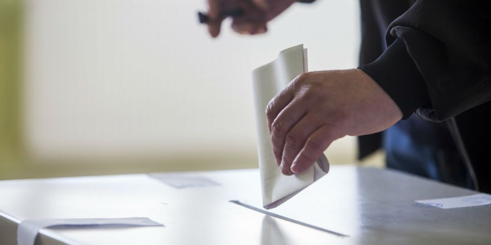 bigstock-Voting-Hand-76590503