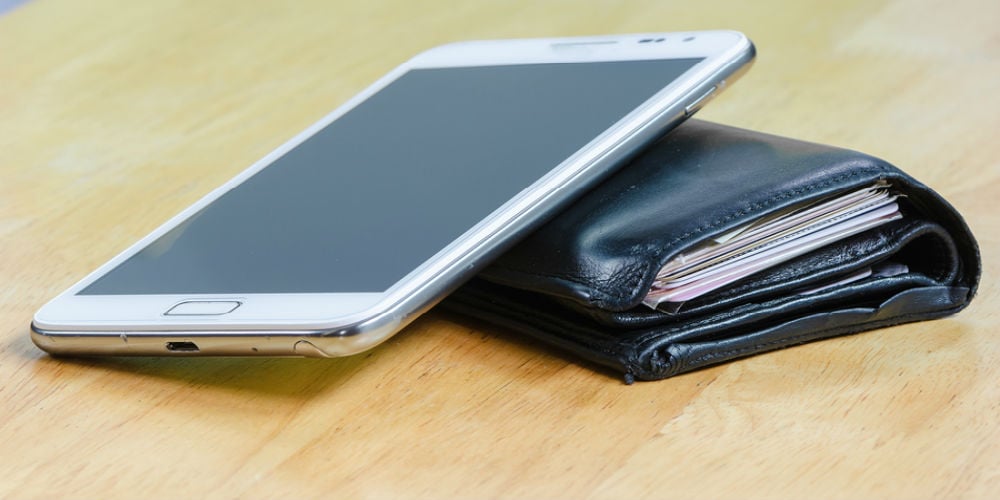 bigstock-Wallet-And-Mobile-Phone-51854737
