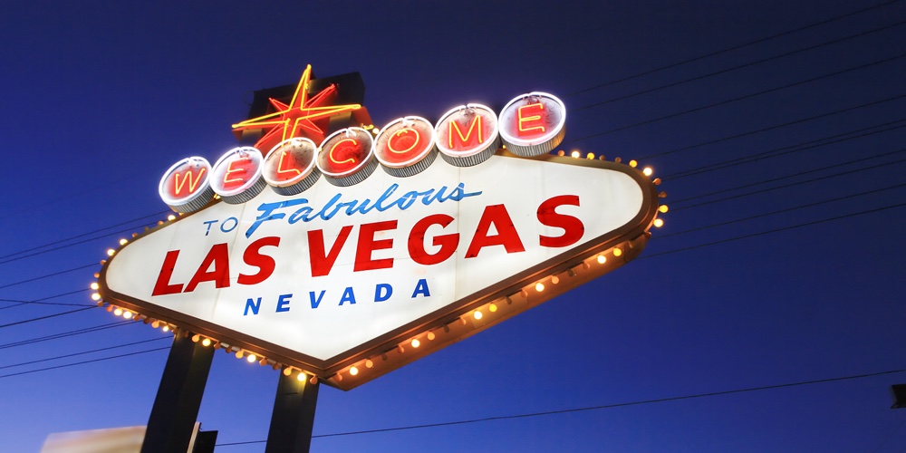 Welcome to Las Vegas sign at twilight|Las Vegas Welcome Sign With Fireworks In Background