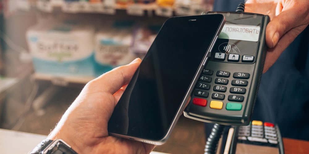 bigstock-Wireless-Payment-For-Buying-A-240938242