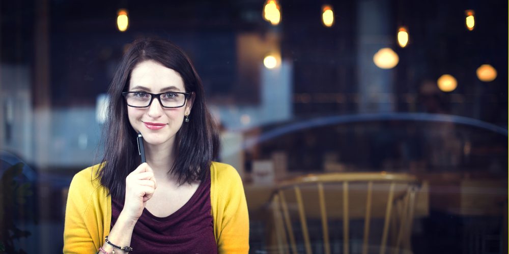 bigstock-Woman-Reading-Studying-Cafe-Re-121865630-e1473967138250