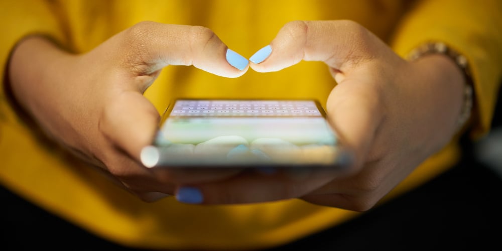 bigstock-Woman-Typing-Phone-Message-On-145573157