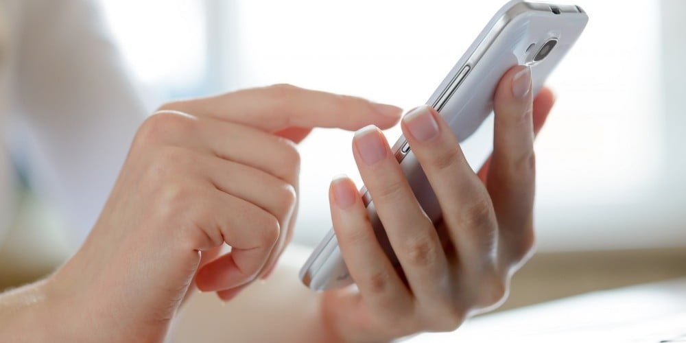 bigstock-Woman-Using-Her-Mobile-Smart-P-82320362-e1456503534107