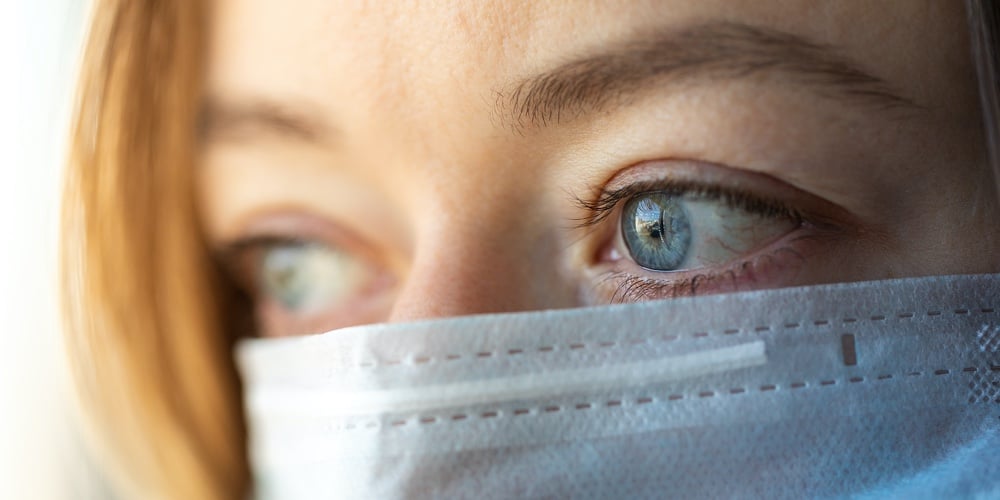Woman Wearing Medical Mask. Woman With A Blue Medical Mask. Protective Medical Mask. Health Care And
