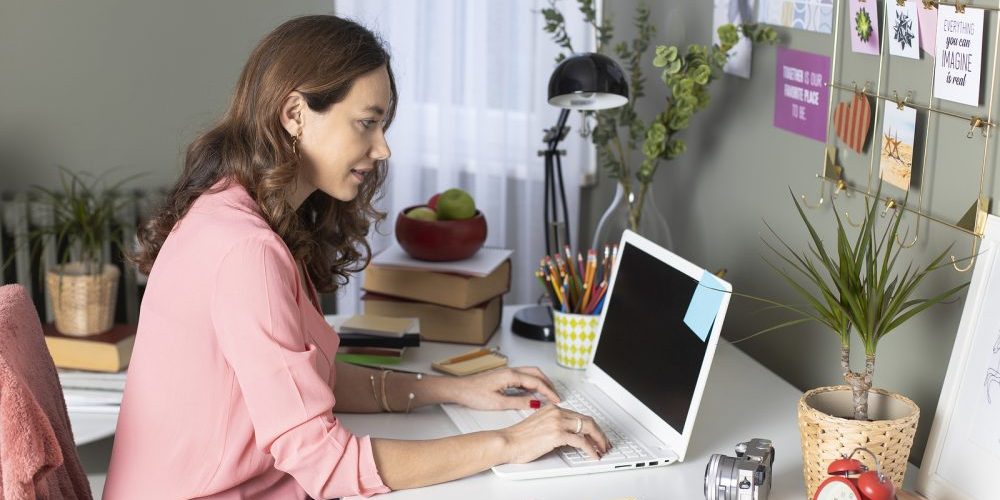 Woman Working From Home. Freelance Working At Home. She Is Desig