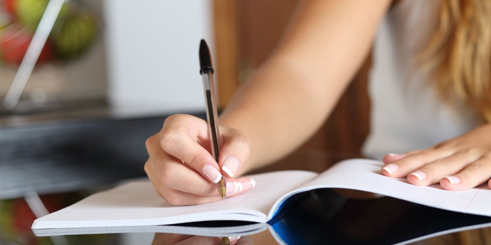 bigstock-Woman-Writer-Hand-Writing-In-A-84420782