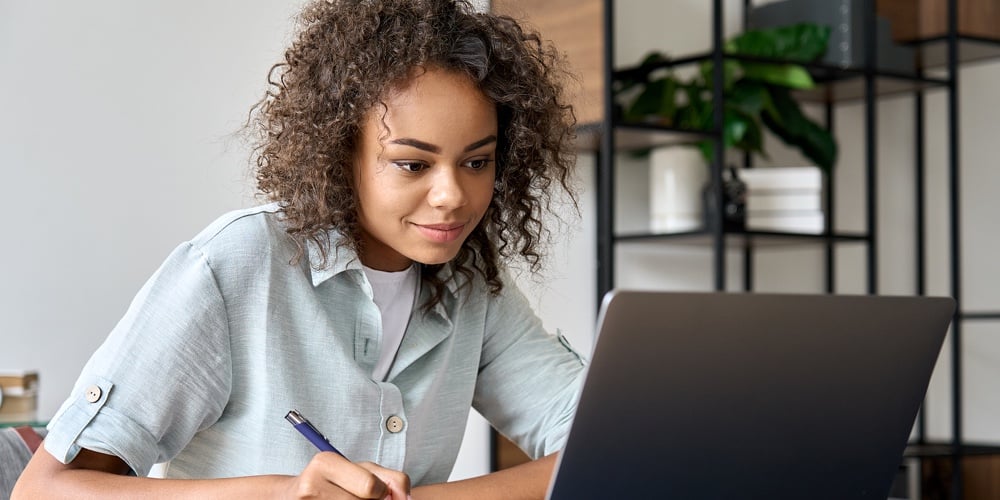 Young African American Girl Student Studying Virtual Course
