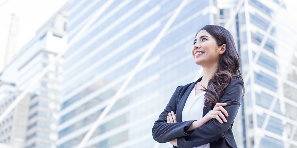 Young Beautiful Business Woman Standing In City With Success Feeling For Work. Young Business Woman