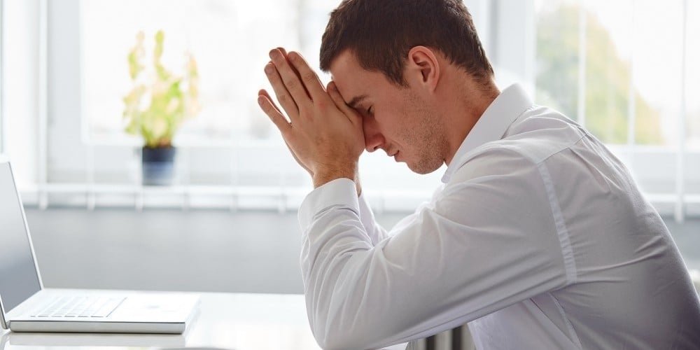bigstock-Young-Business-Man-Under-Stres-89718578-e1446206462272