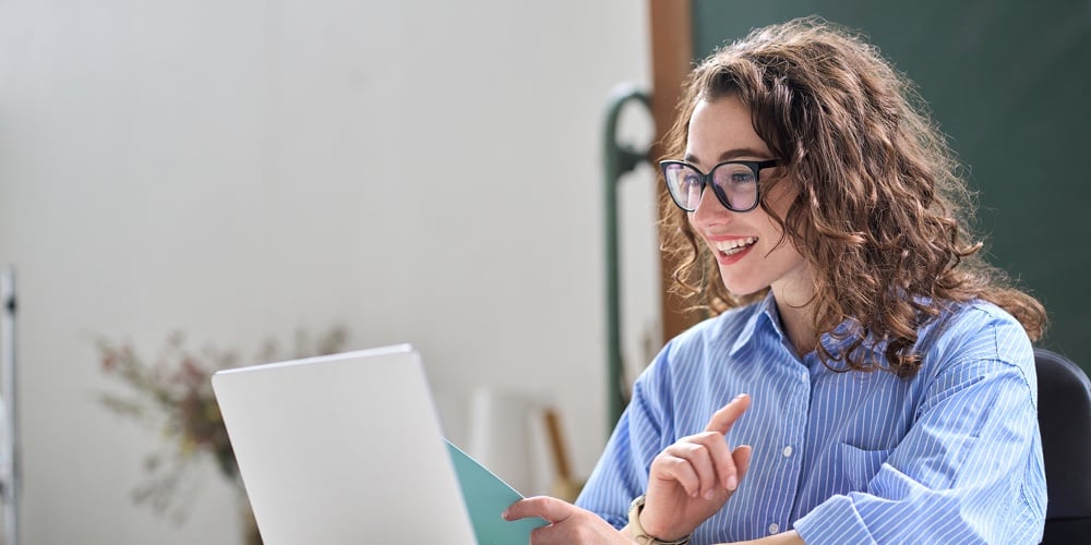 Young Business Woman Hr Manager Coach Looking At Laptop Talking Leading Hybrid Conference Online Rem