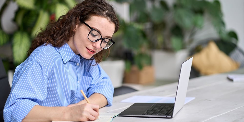 Happy Beautiful Freelancer Blogger Typing Keyboard On Laptop For Writing Blog Web Page