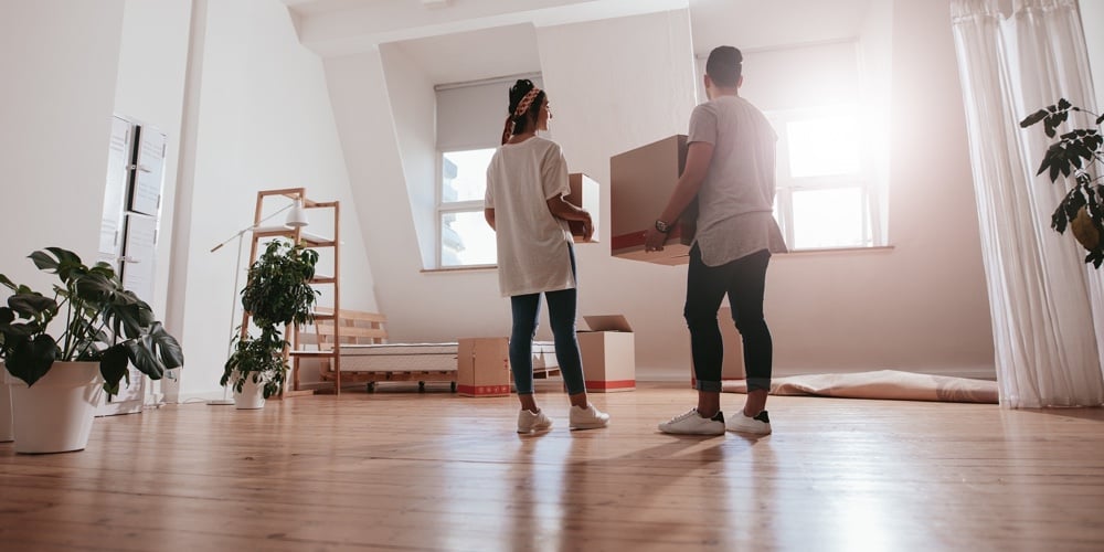 bigstock-Young-Couple-Moving-In-New-Hou-196164721