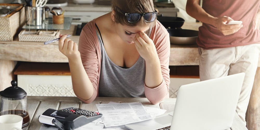 bigstock-Young-Family-Facing-Debt-Probl-164618939