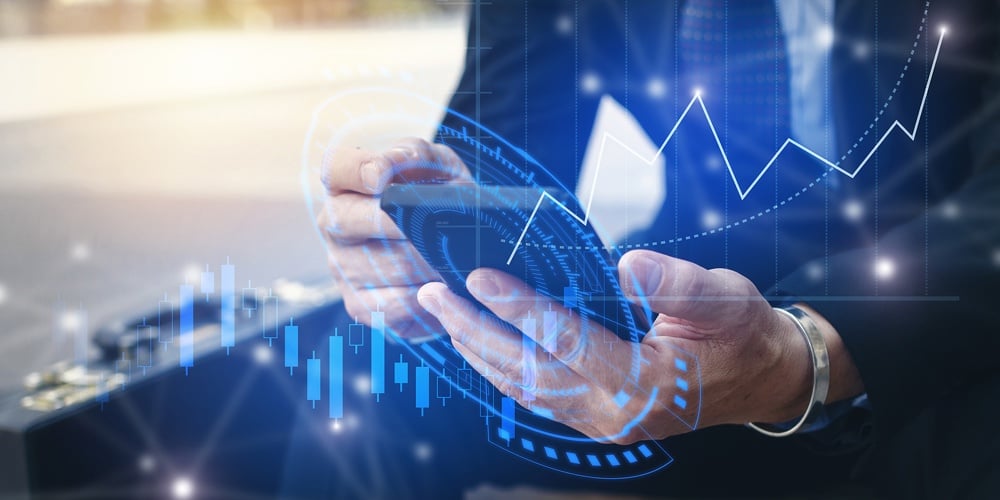 Young Investor Or Business Man Using Mobile Phone With Graphic Global Network Connection And Graph C