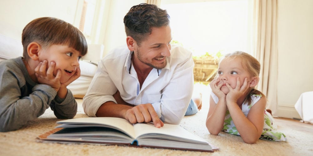 bigstock-Young-Man-With-Two-Kids-Readin-91106039