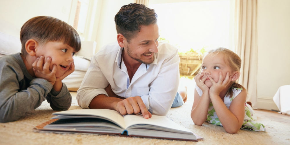 bigstock-Young-Man-With-Two-Kids-Readin-91106039