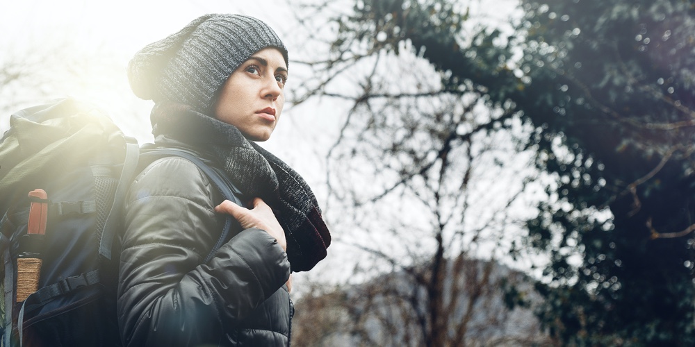 Young Woman With Backpack In Forest. Concept Travel Tourism Adventure Hike And People
