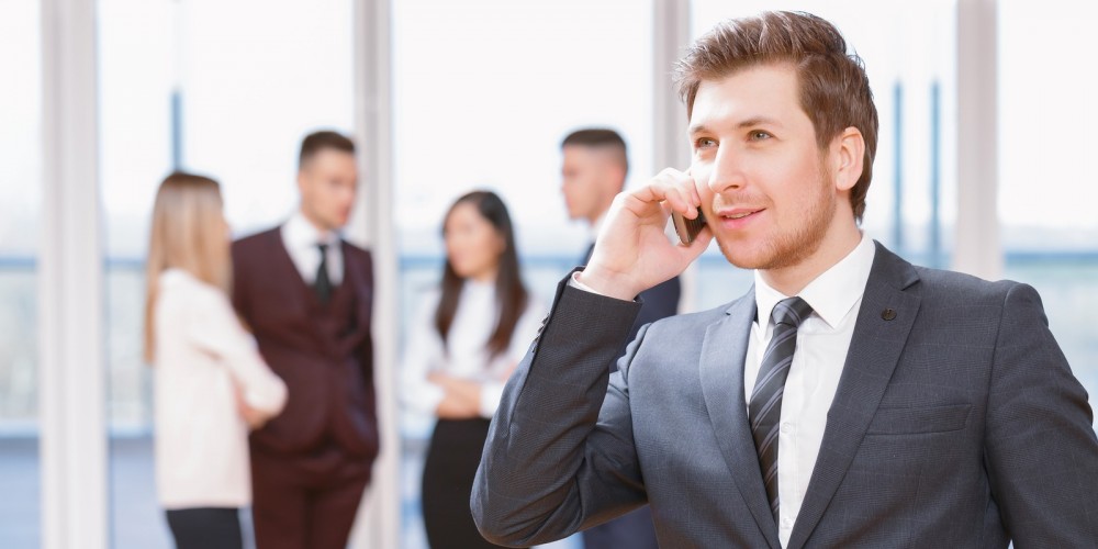 bigstock-Young-business-man-standing-in-89596130-e1448887934709
