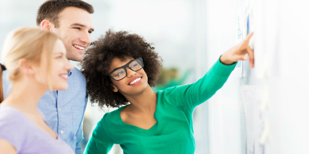 bigstock-Young-business-people-discussi-77002319