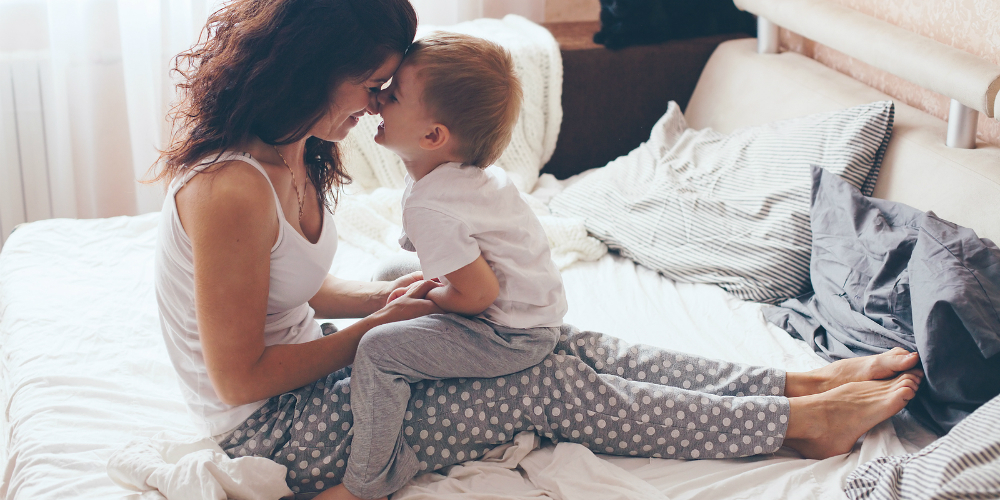 bigstock-young-mother-with-her-years-103285265