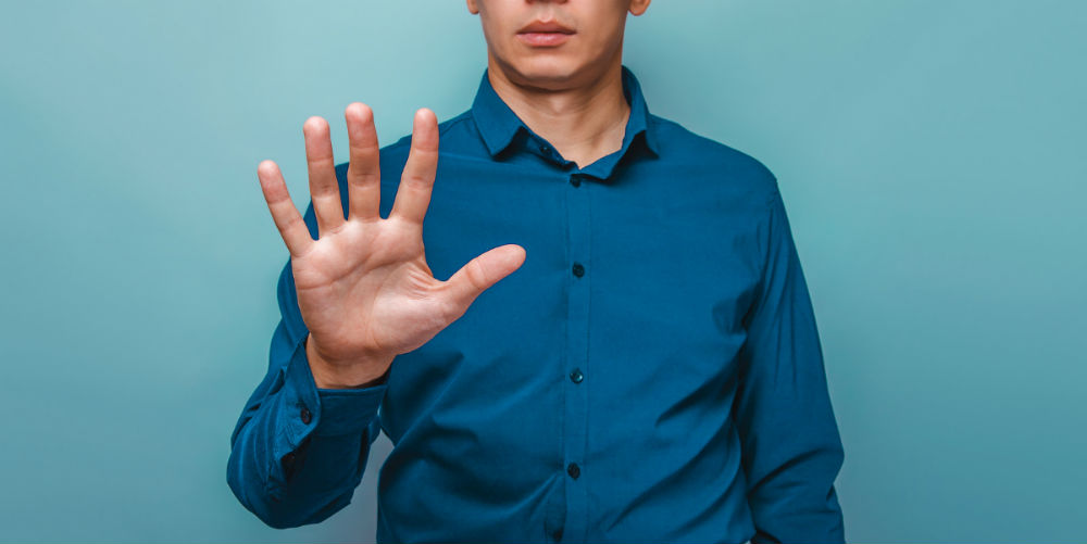 bigstock-a-man-can-be-seen-half-face-sh-104581904
