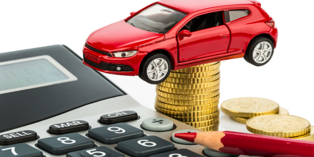 bigstock-car-and-calculator-rising-cos-59208170
