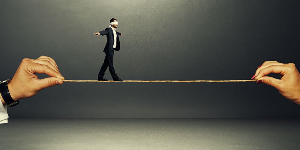 bigstock-man-with-the-blindfold-walking-65680705