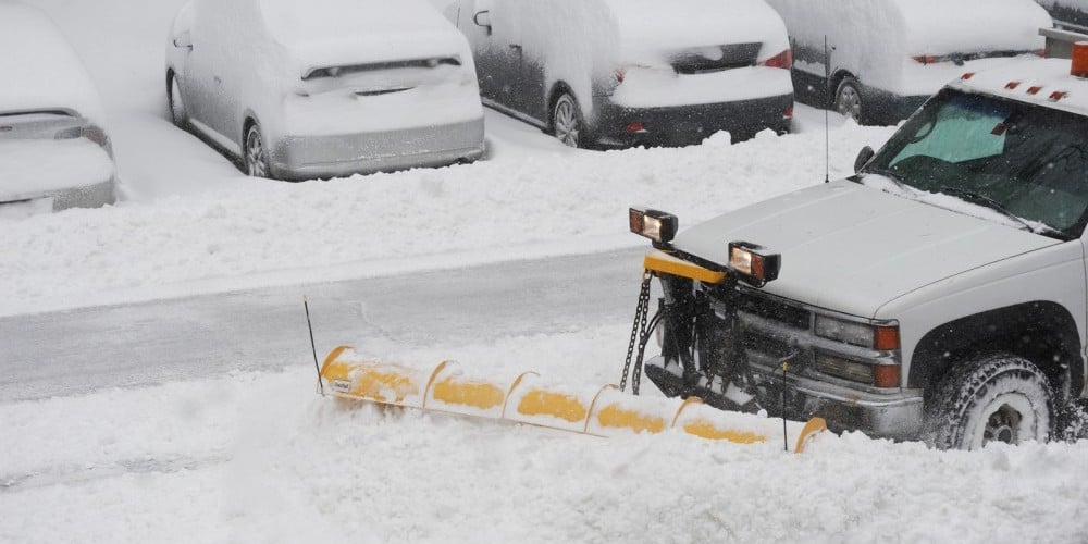 bigstock-snowplow-removing-snow-on-the-113076422-e1453725225561