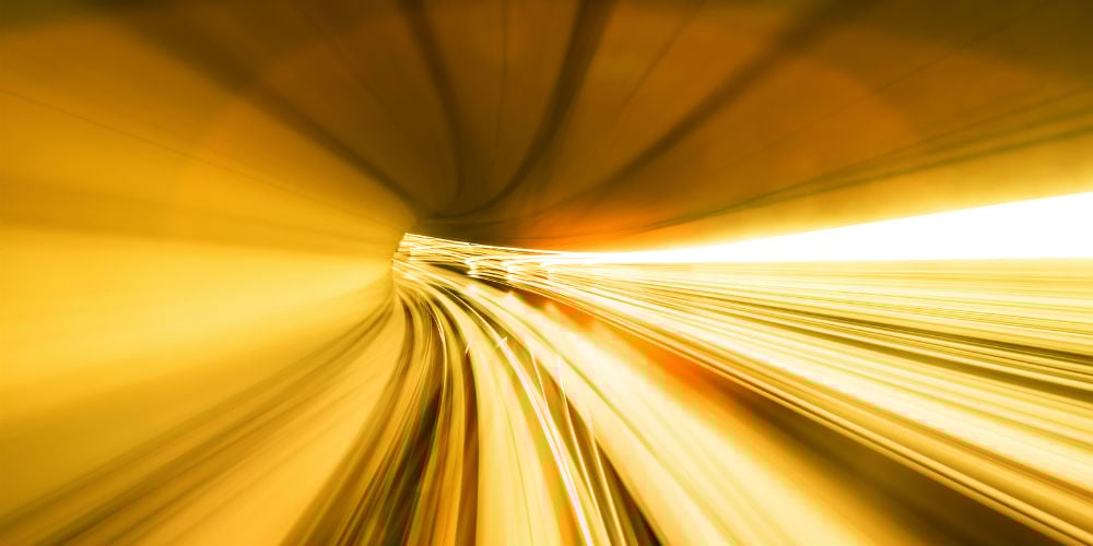 bigstock-train-moving-fast-in-tunnel-45040585
