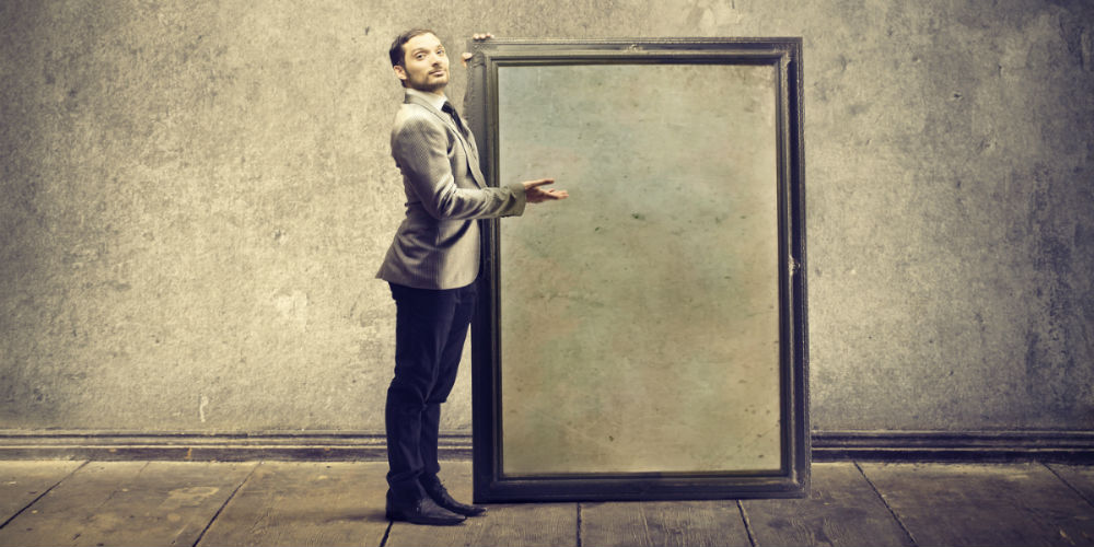 shj|bigstock-young-man-shows-large-frame-47465686