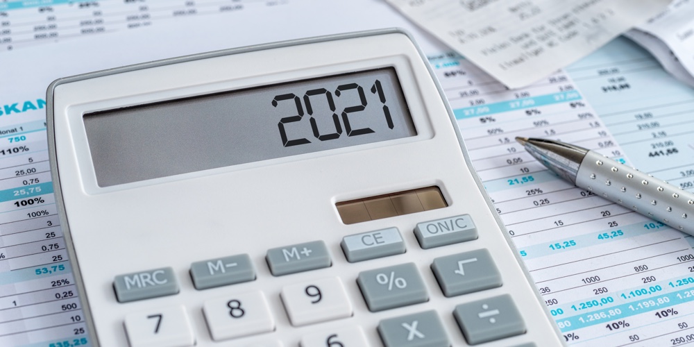 A calculator with the 2021 on the display