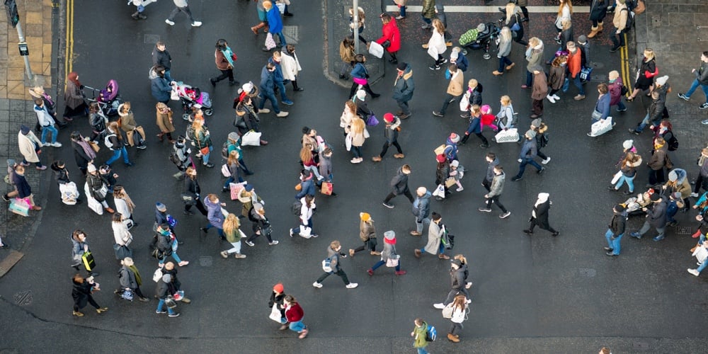 Pedestrian crowds crossing the street – photographed from directly above