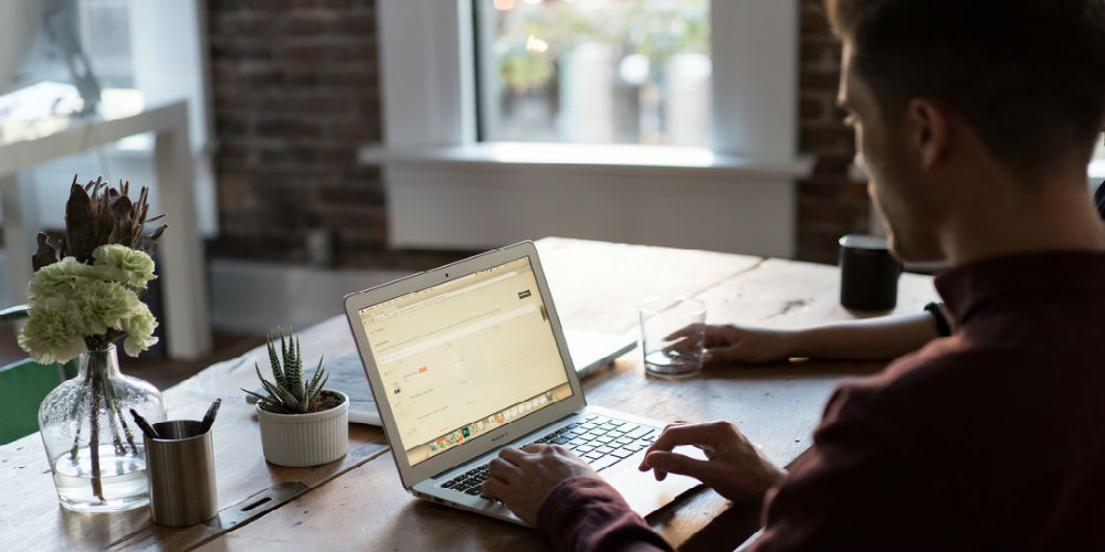 man on computer