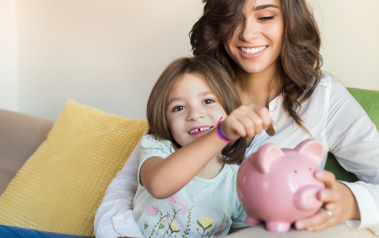 Mom And Daughter Saving Money