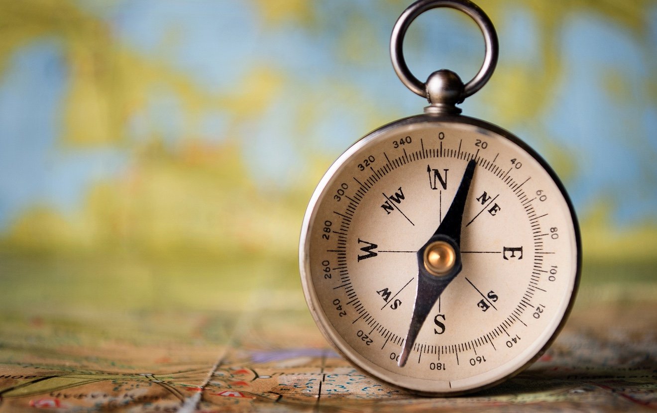 Magnetic Compass On A World Map